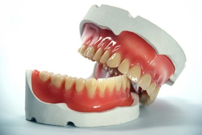 Полный протез зубов
